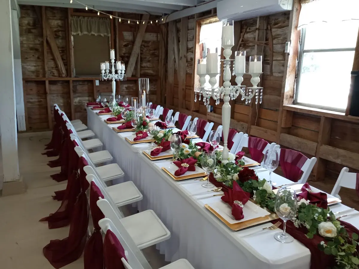 A beautifully designed table and chairs decorated for an event